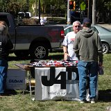 Tom visiting with an inquisitive passerby.