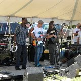 Slow Ya Roll on the music stage winding up their set by the time I got there.