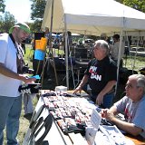 Ryan Ogle (left) was the music coordinator for the event. While visiting at the booth we learned that as a young man Ryan had many memorable encounters with Dan Falley when he had his shop at 45th &#38; Topeka Blvd.